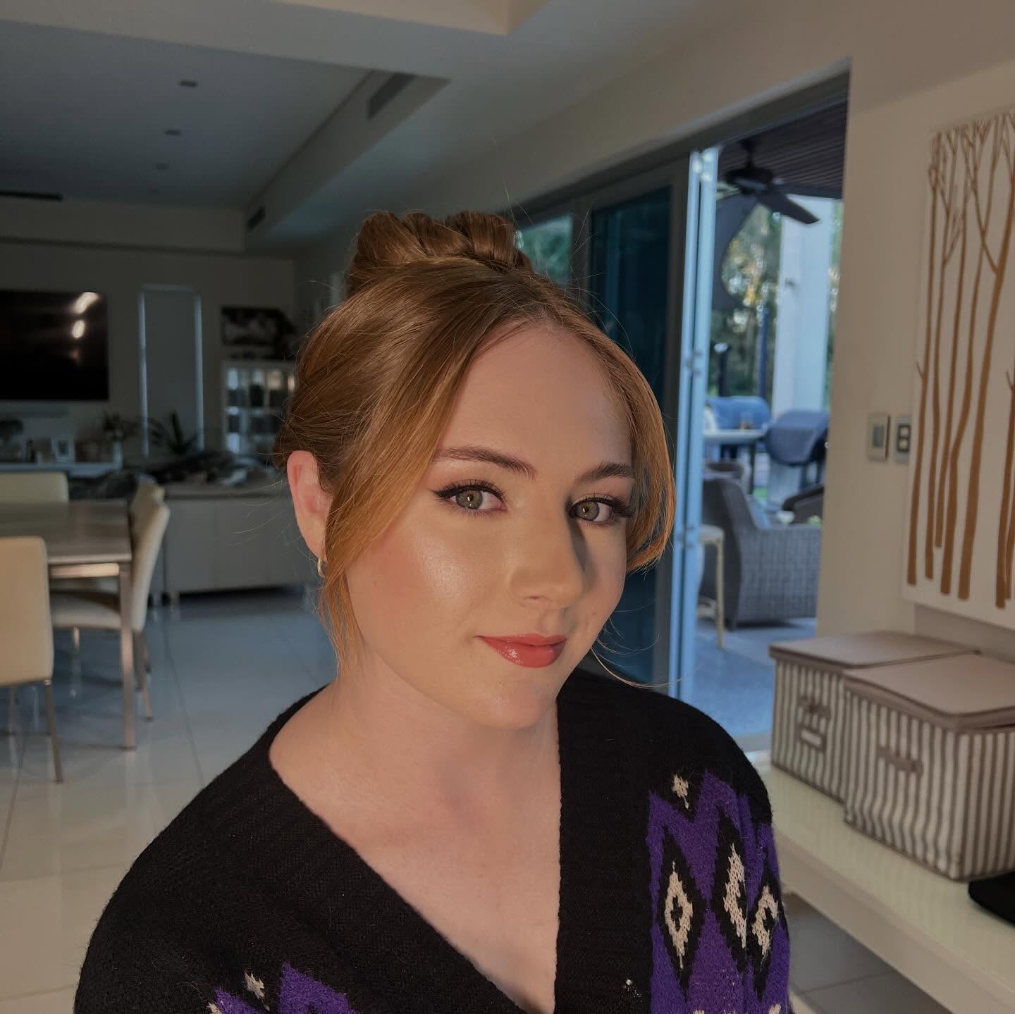 Bridal makeup — bride with veil and bouquet