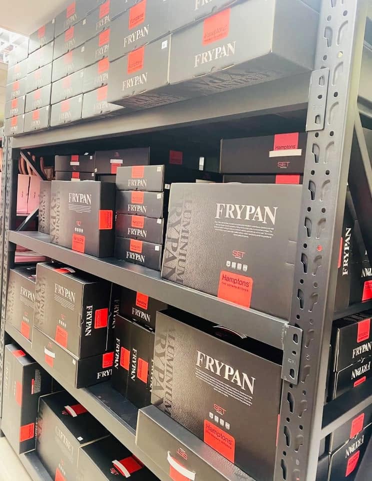 Shelves of frypan and cookware sets