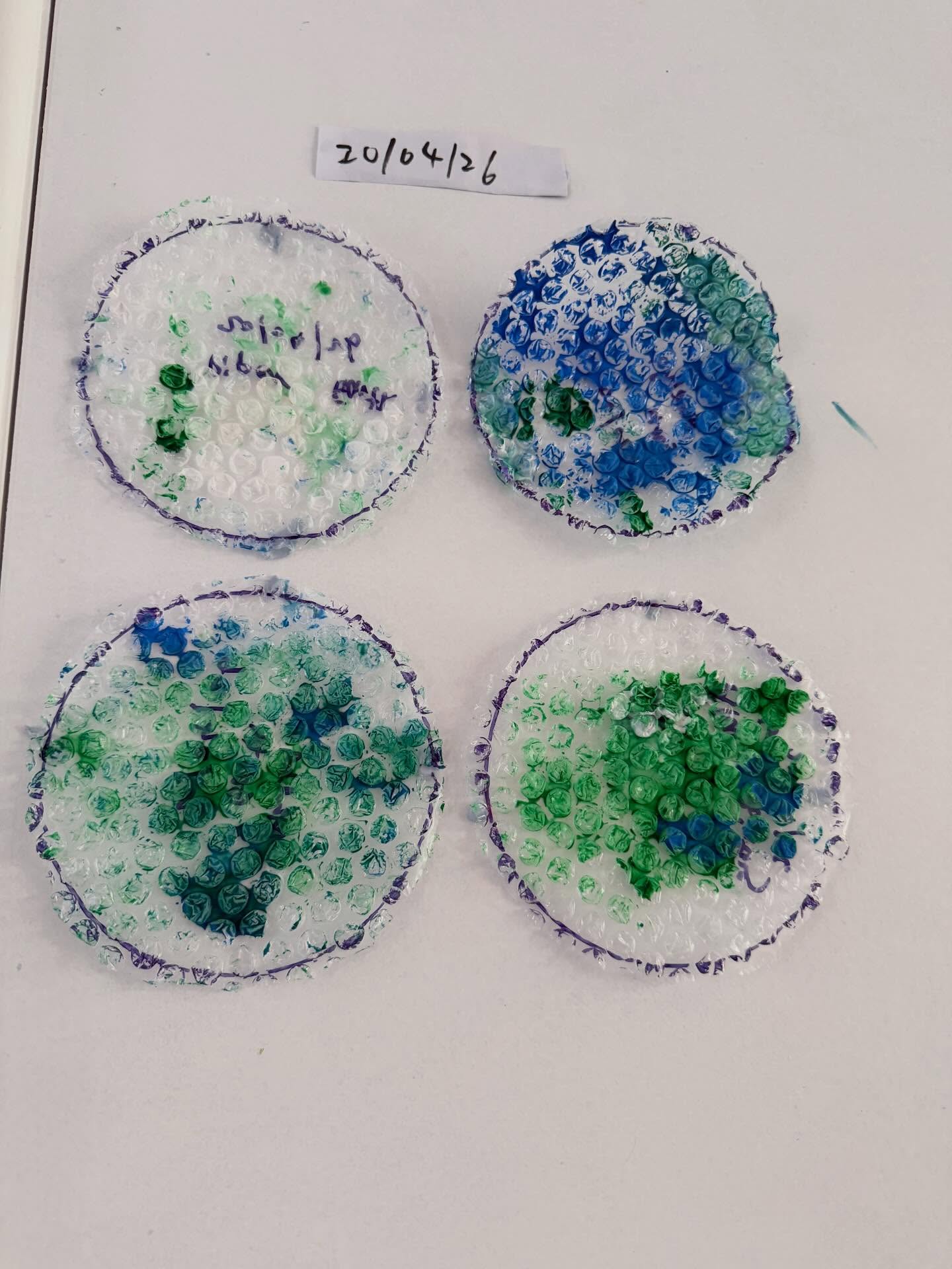 Children's bubble-wrap print art activity at Little Ladybug Family Day Care