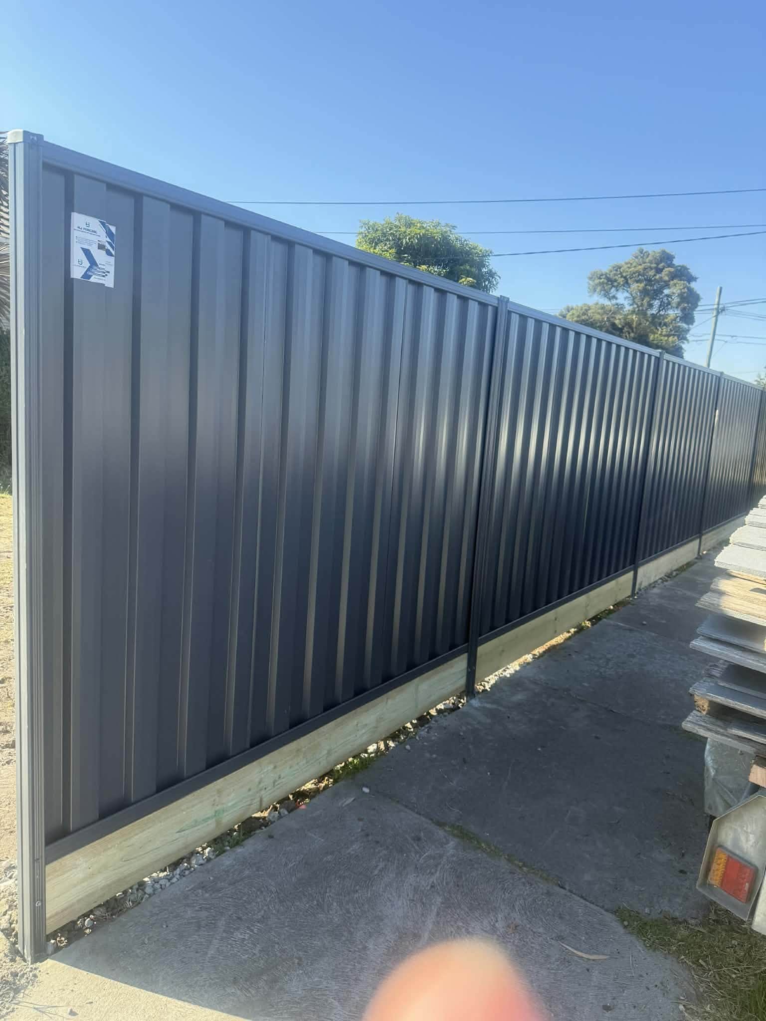 Newly installed Colorbond side fence beside a St Albans home