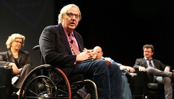 Accessibility advocate speaking at a panel discussion