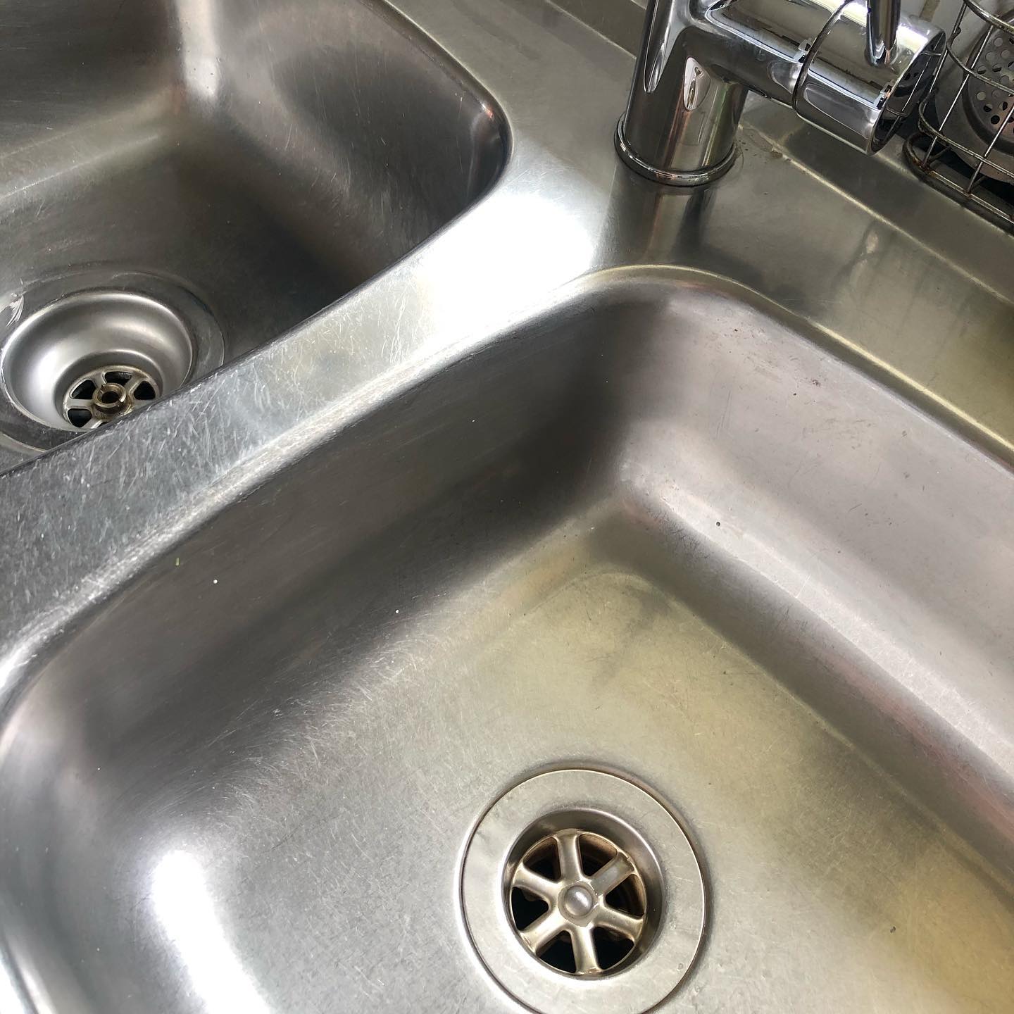Shining clean stainless steel kitchen sink — The Cleaning Co Sydney work quality