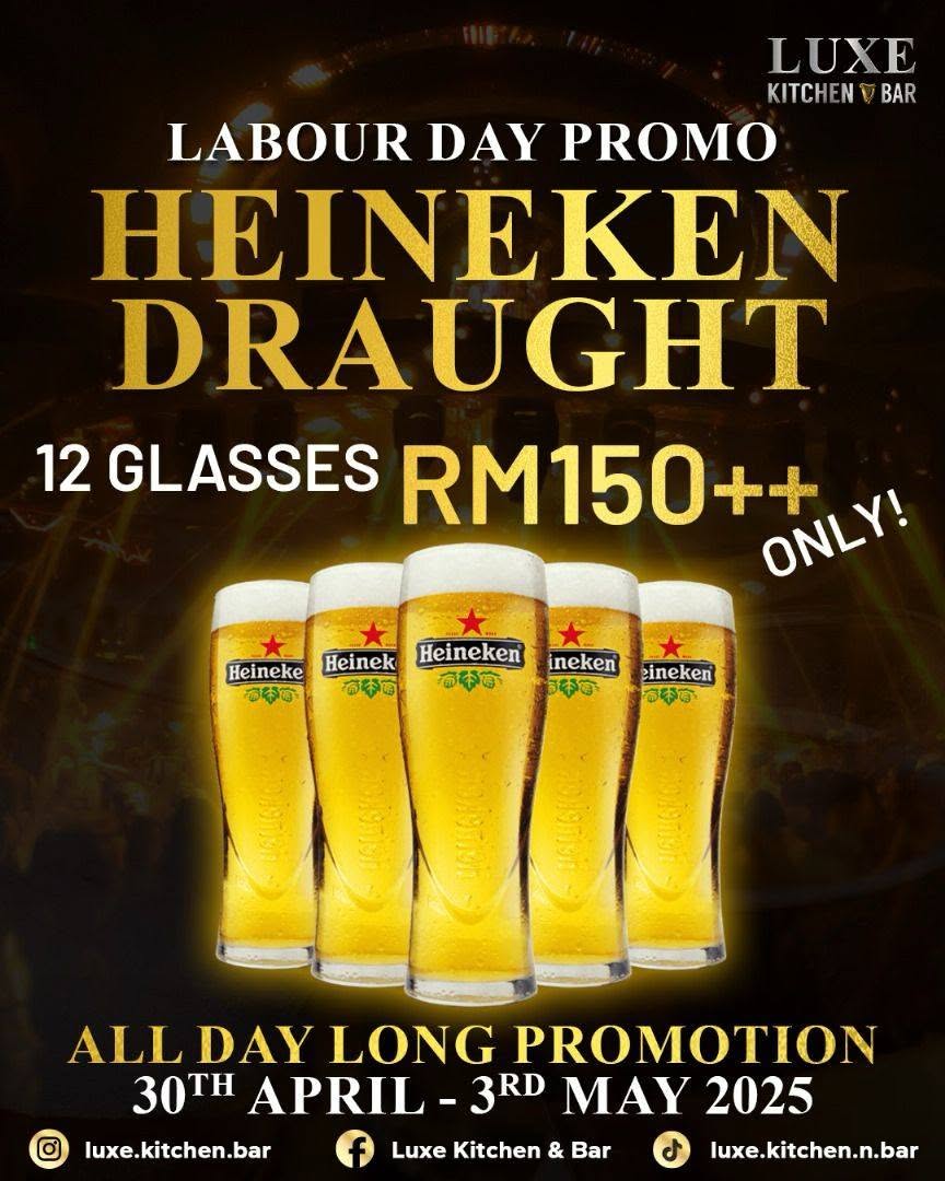 Five chilled glasses of Heineken draught beer lined up and ready to serve