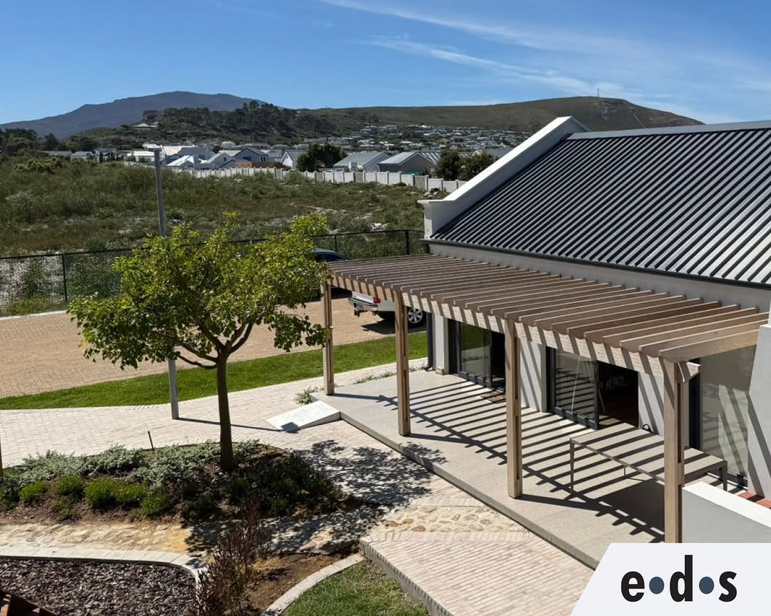 Completed residential structural engineering project — modern home with pergola
