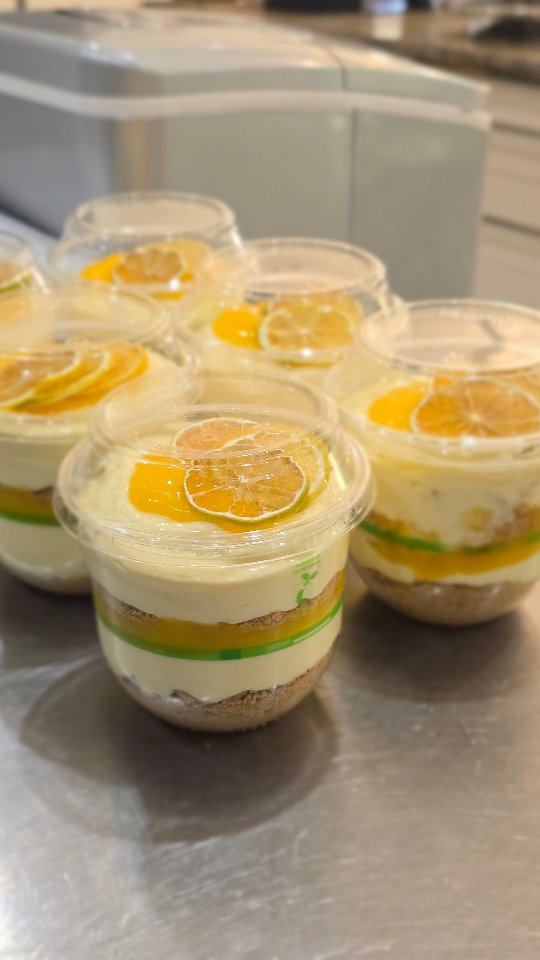 House-made lemon cheesecake cups ready to serve