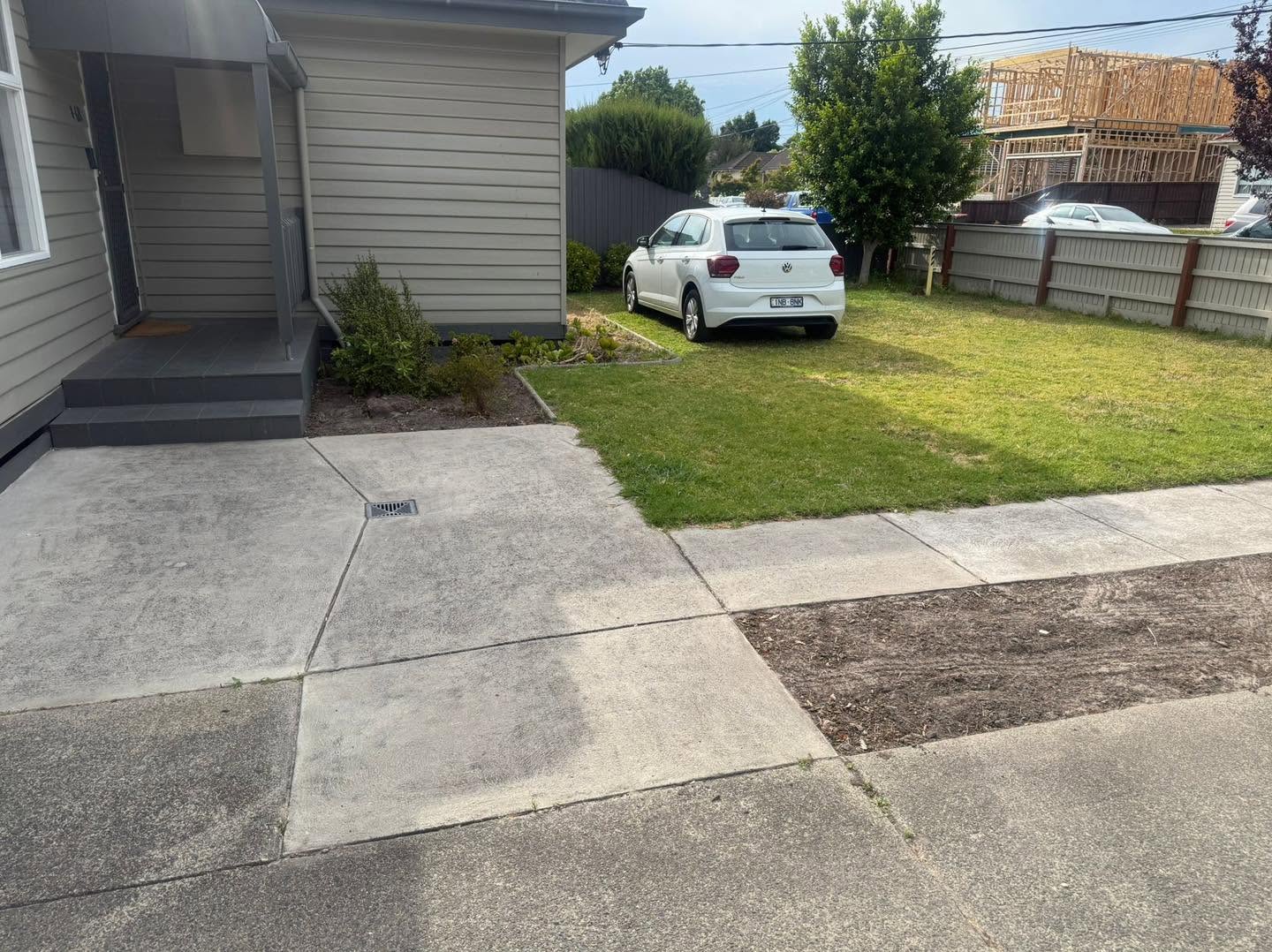 Concrete driveway and lawn landscaping in Melbourne suburb