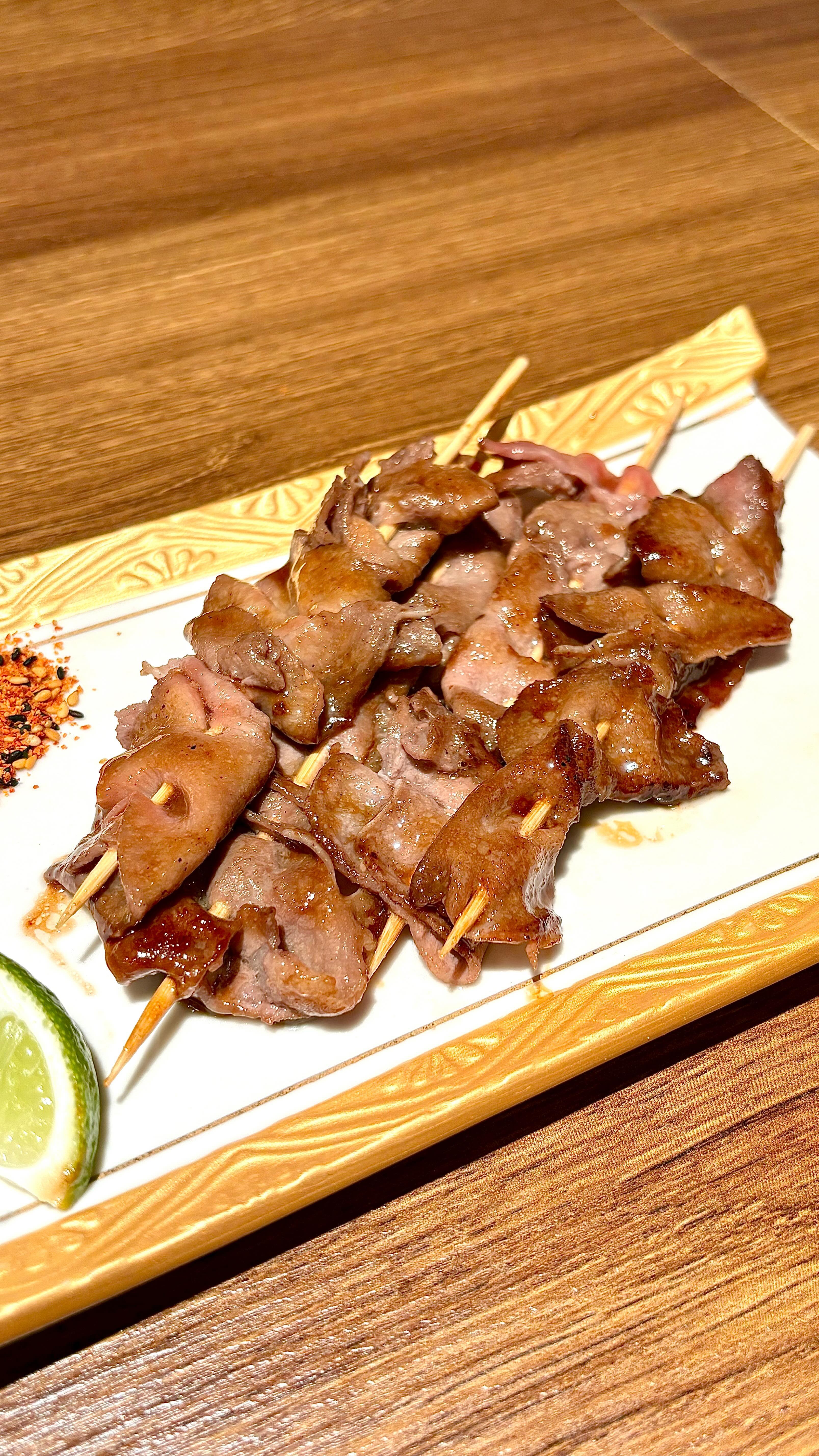 Wagyu beef skewers grilled and glazed, served with lime at UMAYA World Square