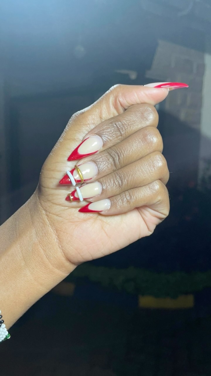 Long red stiletto french-tip nail art