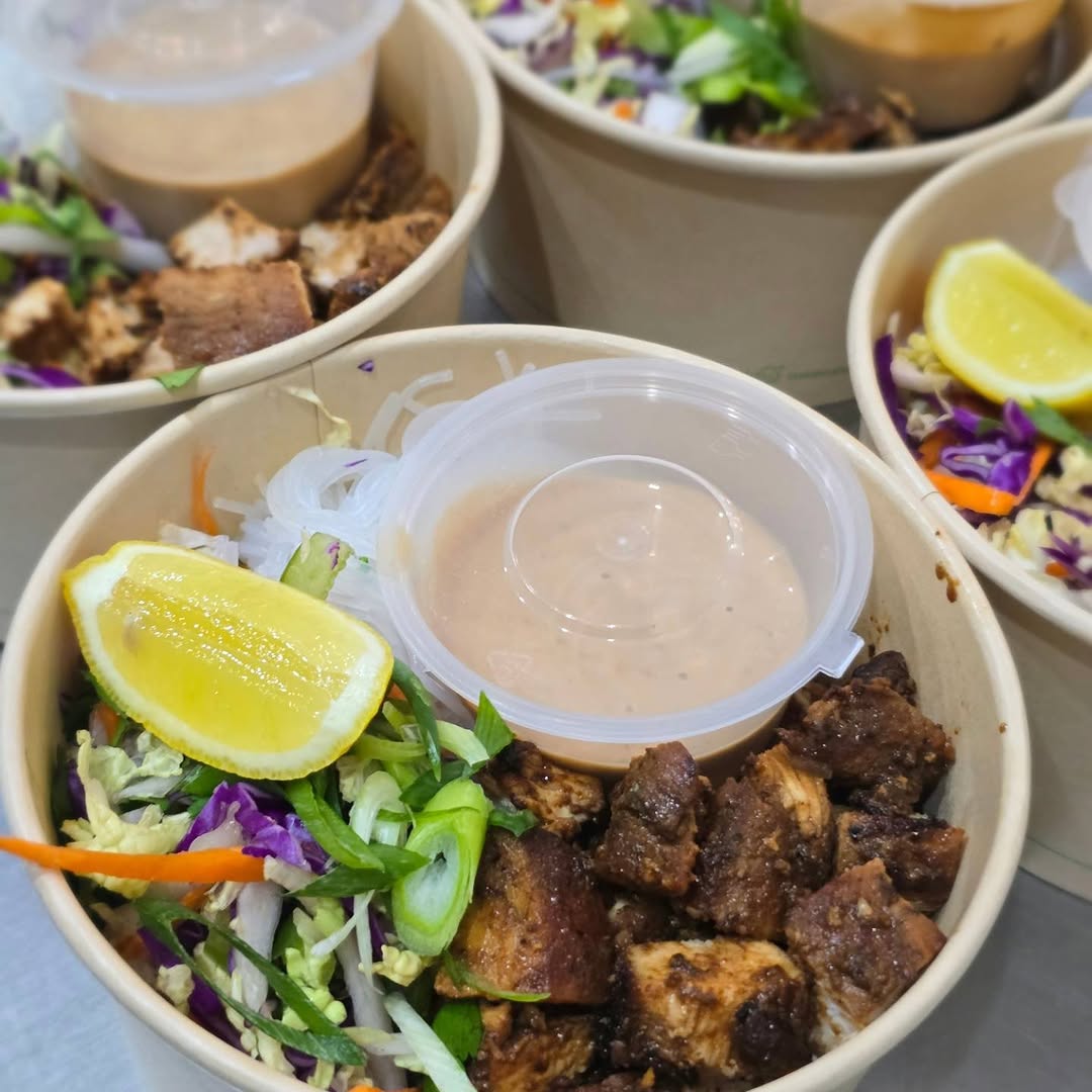 Salad bowl with glazed chicken, fresh slaw and dipping sauce
