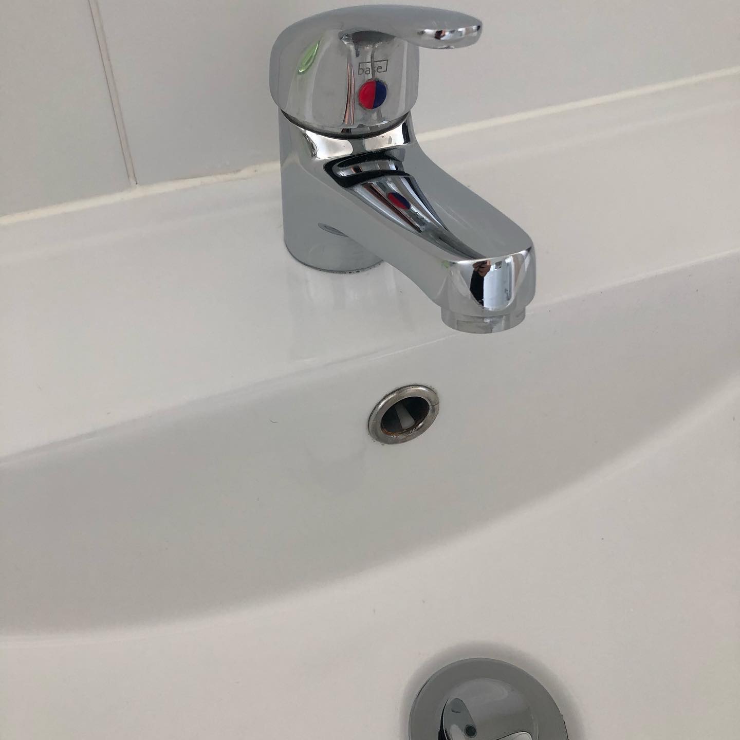 Sparkling clean bathroom sink and tap — a result of The Cleaning Co Sydney's professional service