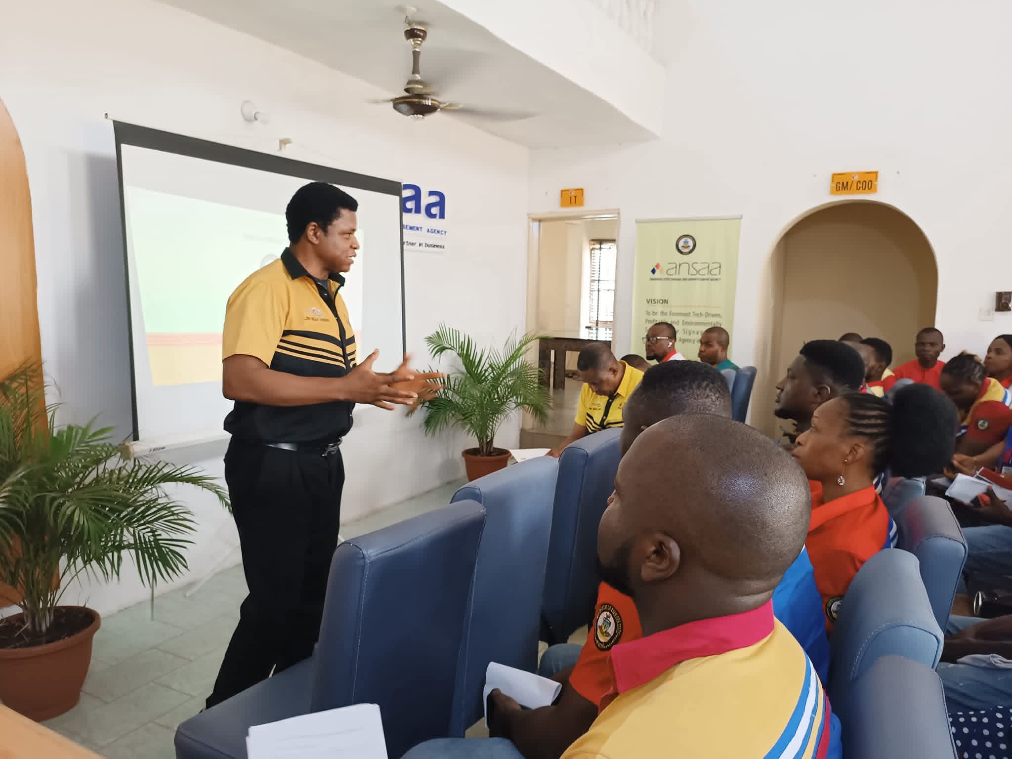 ANSAA team training session with director speaking to staff