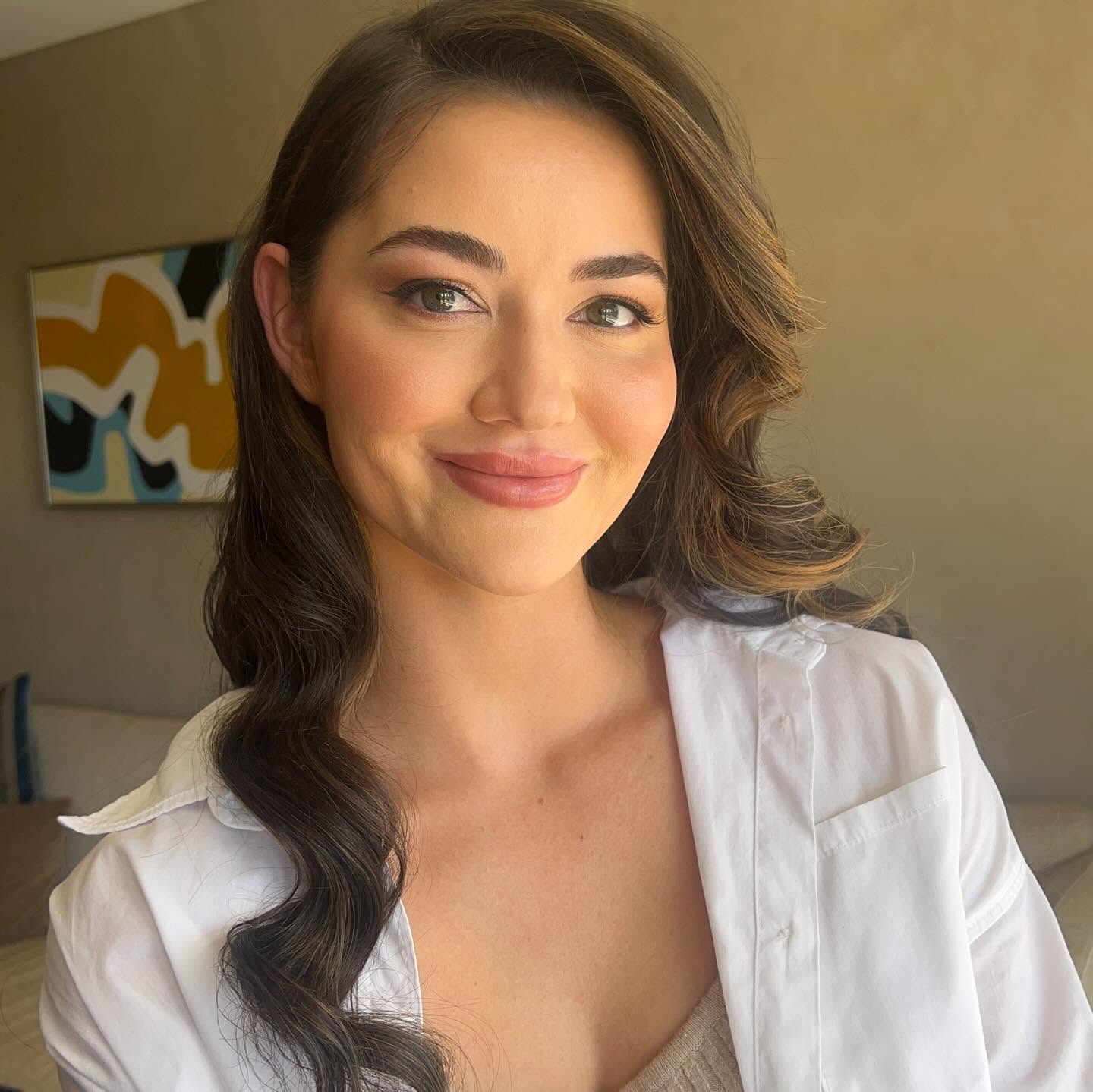 Shimmer lid and winged liner close-up — golden glam