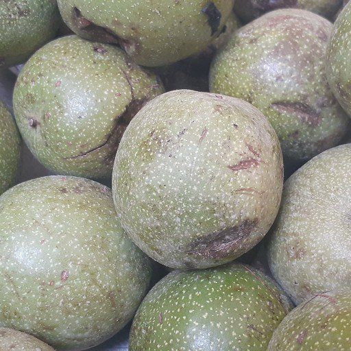 Fresh green passionfruit and round produce