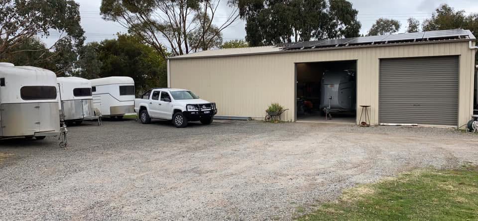 Fix A Float workshop in New Gisborne with horse floats parked outside the shed