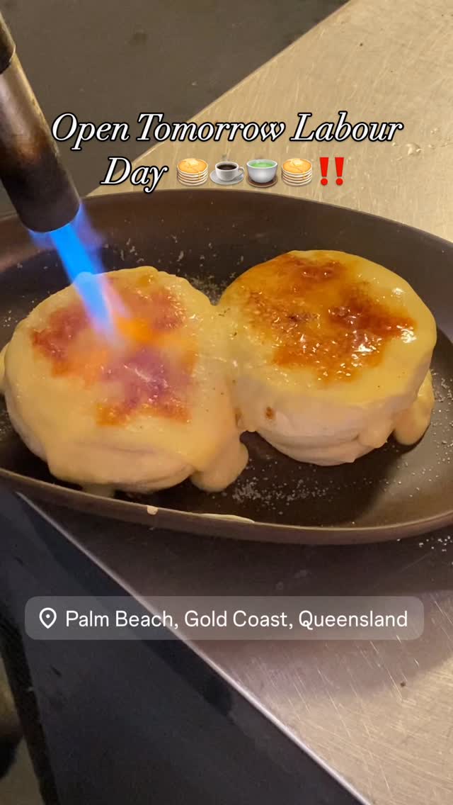 Fluffy Japanese soufflé pancakes being brûléed with a blowtorch in a pan at Cafe Bar DokiDoki