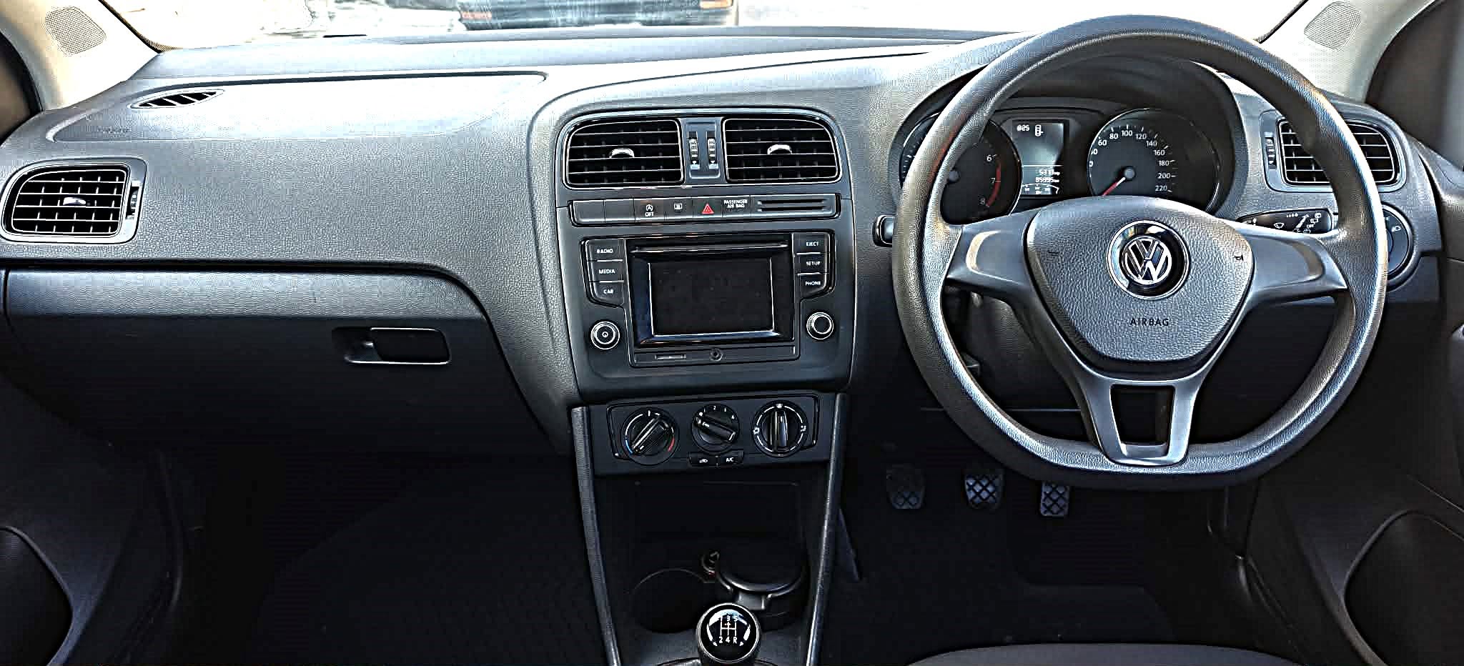 VW dashboard and infotainment system representing quality pre-owned vehicles