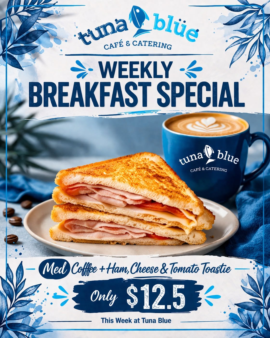 A ham, cheese and tomato toastie on a plate with a Tuna Blue coffee cup