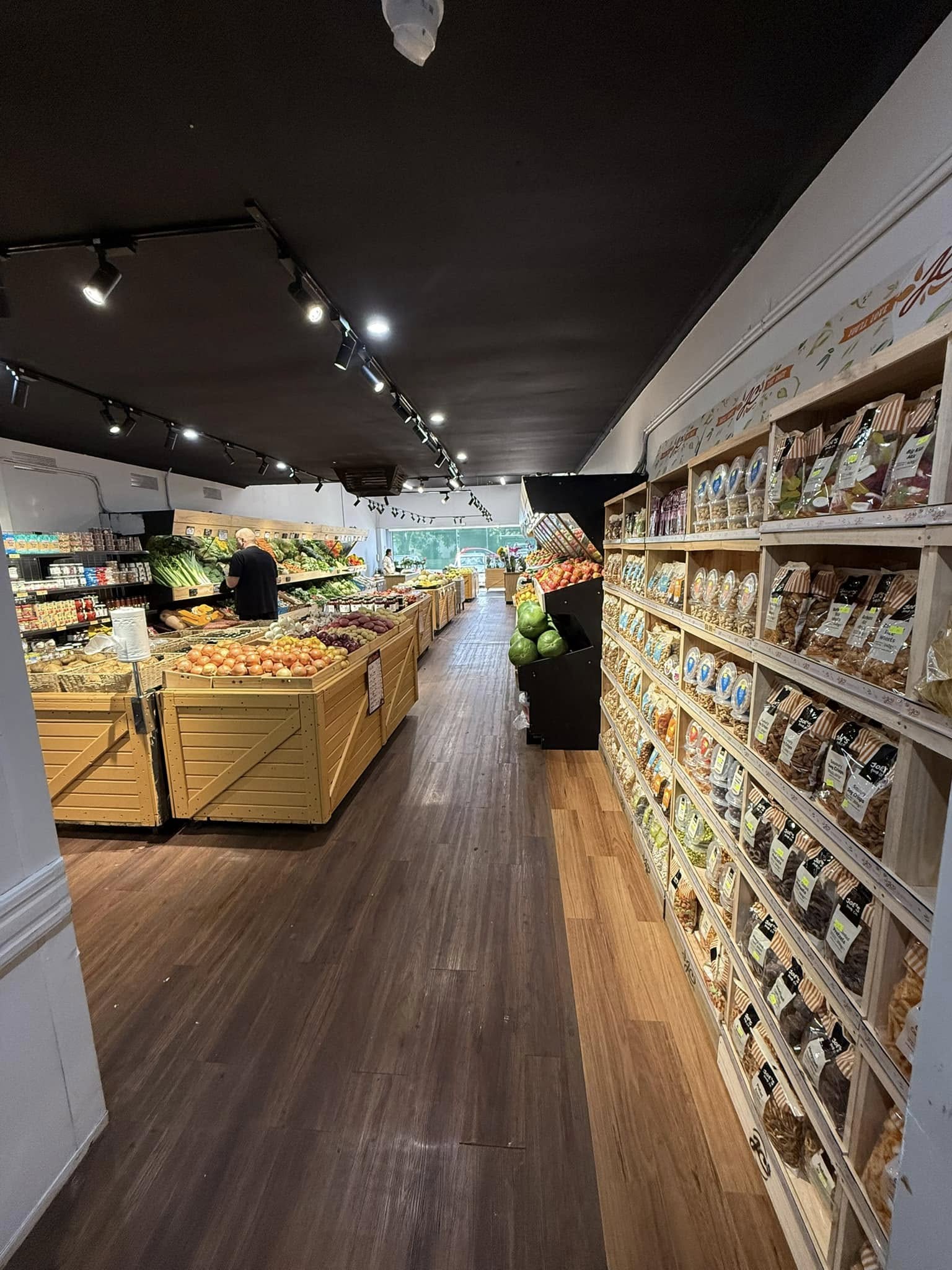 Wide store aisle showing full produce displays at Passion For Produce, Bentleigh East