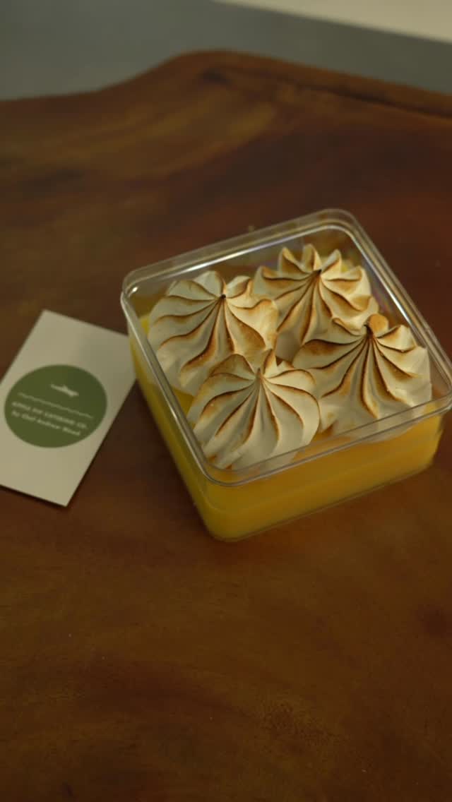 Apple Pip Catering Co lemon meringue dessert in take-home container with branded business card
