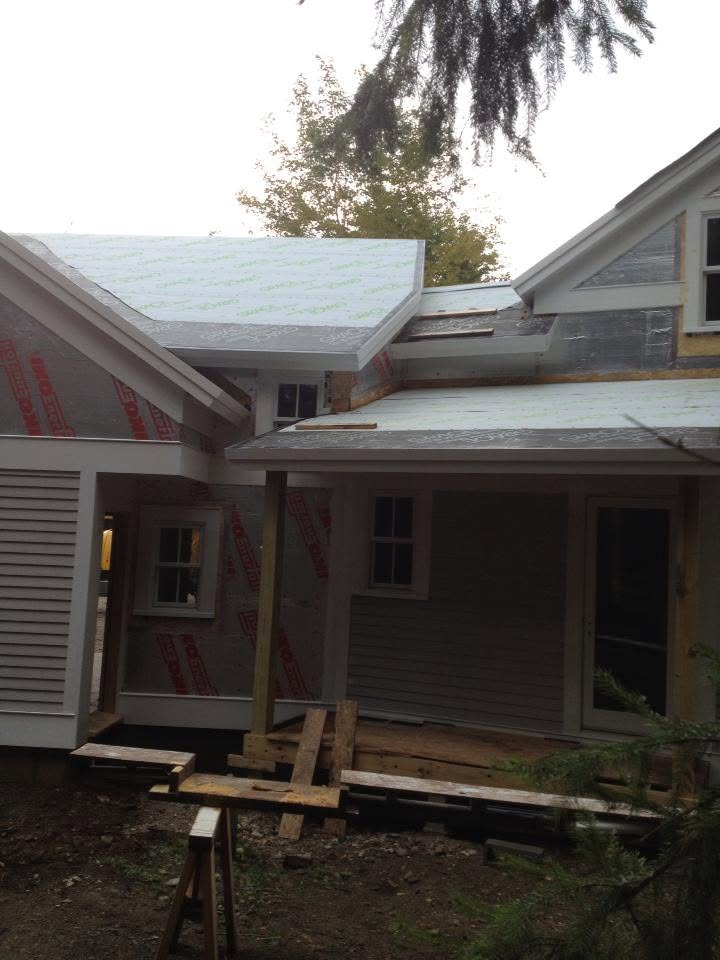 Residential roof and cladding renovation in progress