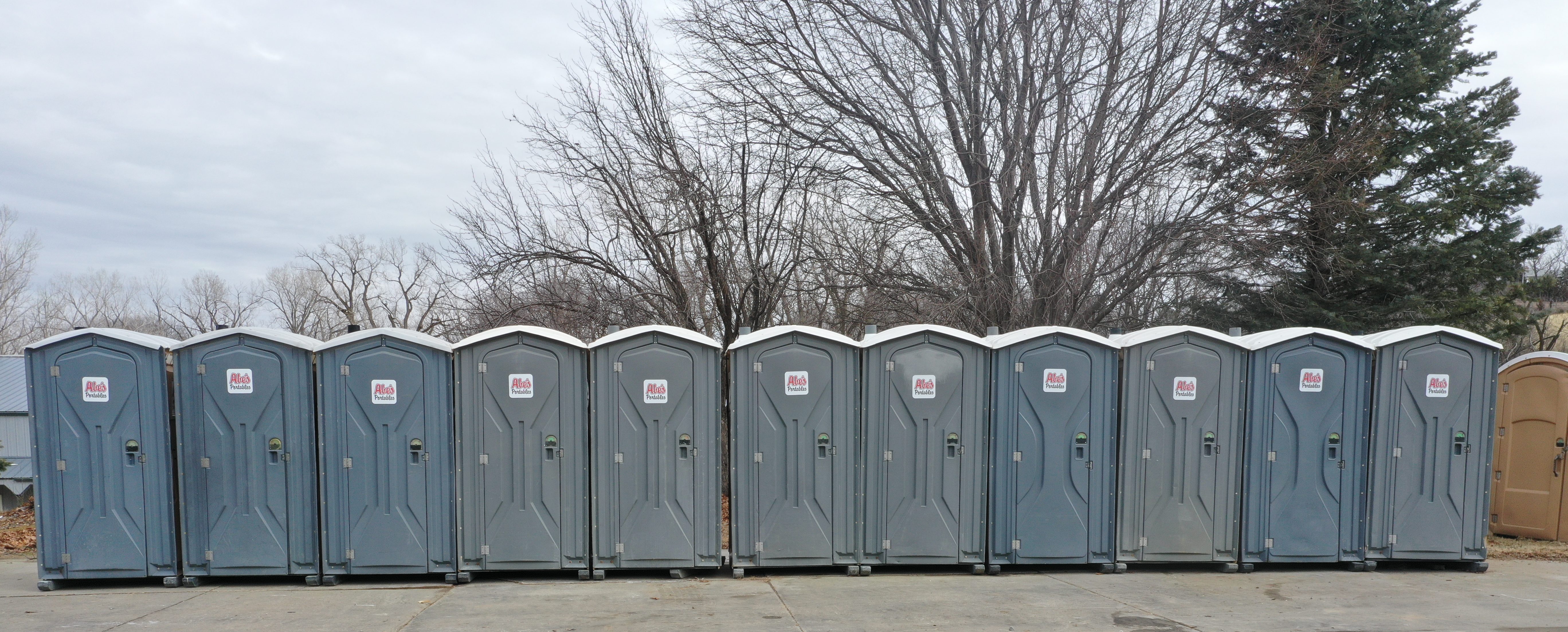 Row of Abe's Portables units ready for deployment