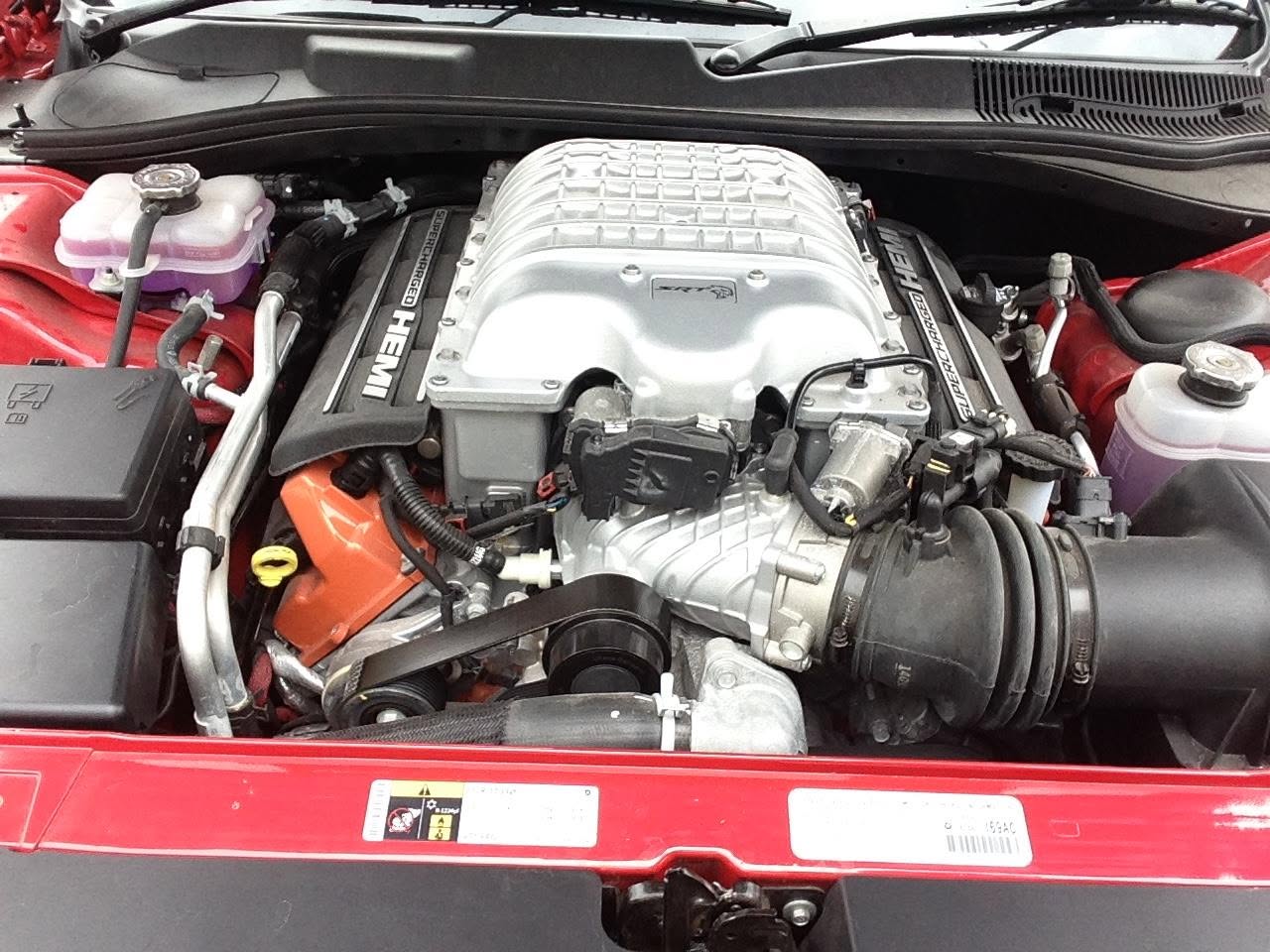 Hellcat supercharged HEMI V8 engine under the bonnet — performance upgrade