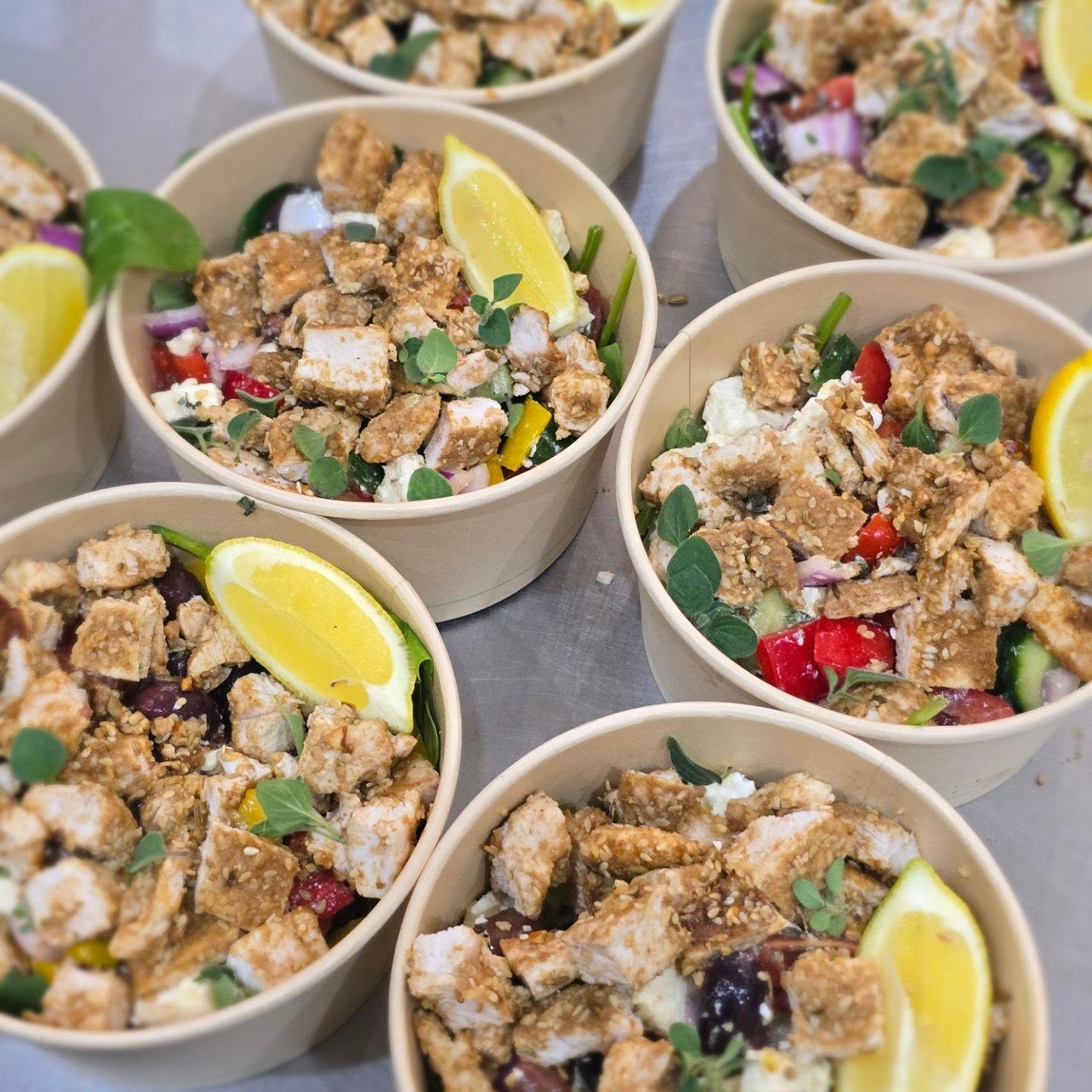 Fresh salad bowls with crispy chicken and lemon served at The Northshore Cafe