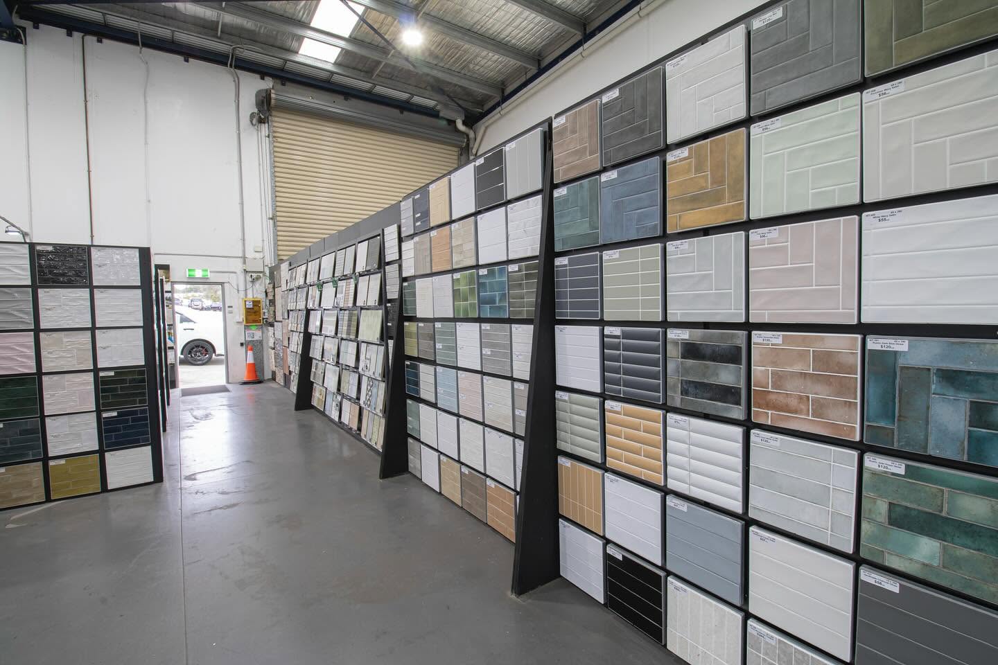 Large tile showroom displaying hundreds of wall and floor tile samples at Wollondilly Tiles Picton