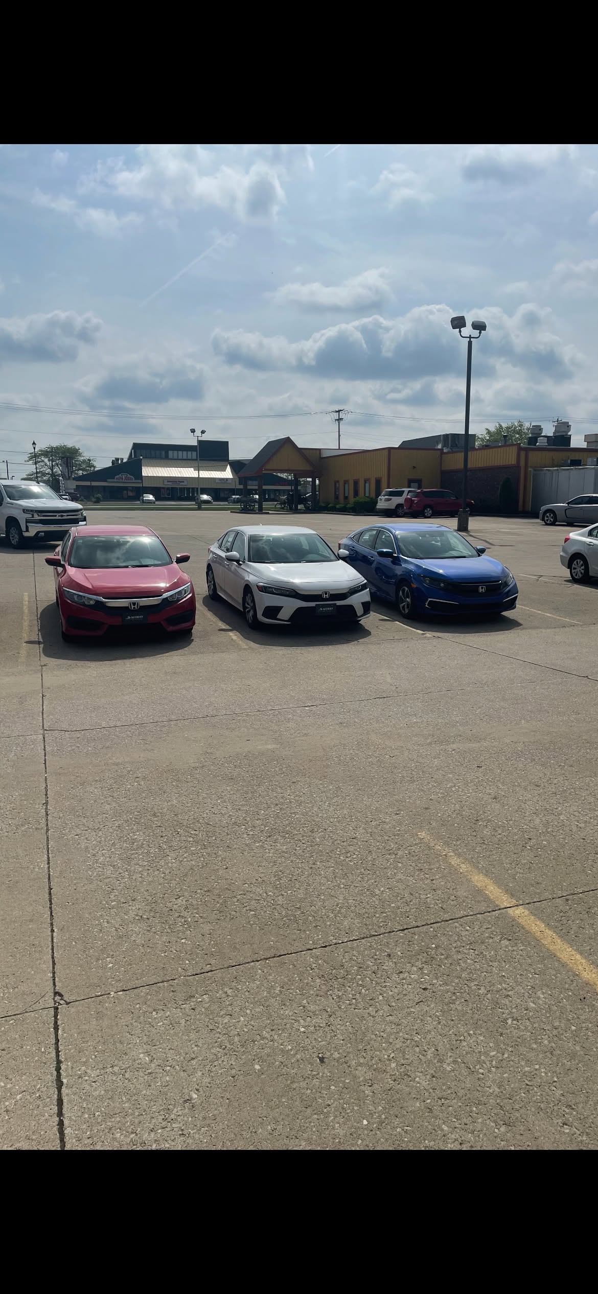 Safeway Drive School training vehicles — a fleet of Honda Civics ready for lessons