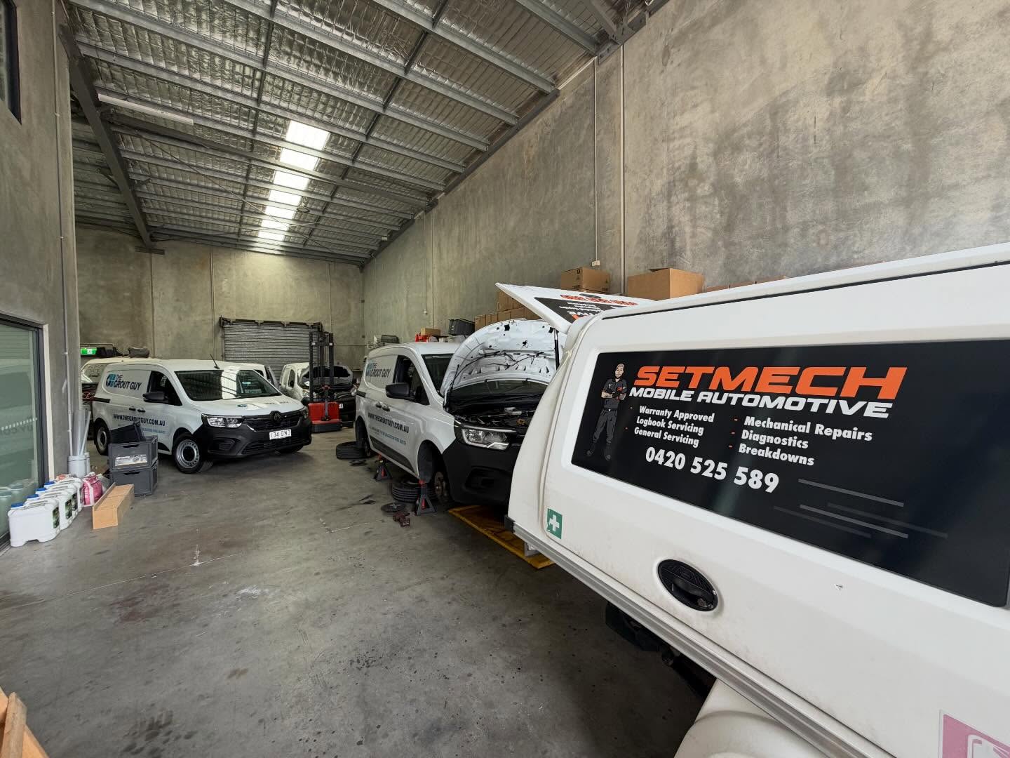 SETMech Mobile Automotive service vehicles set up inside a workshop bay, ready to head out to jobs