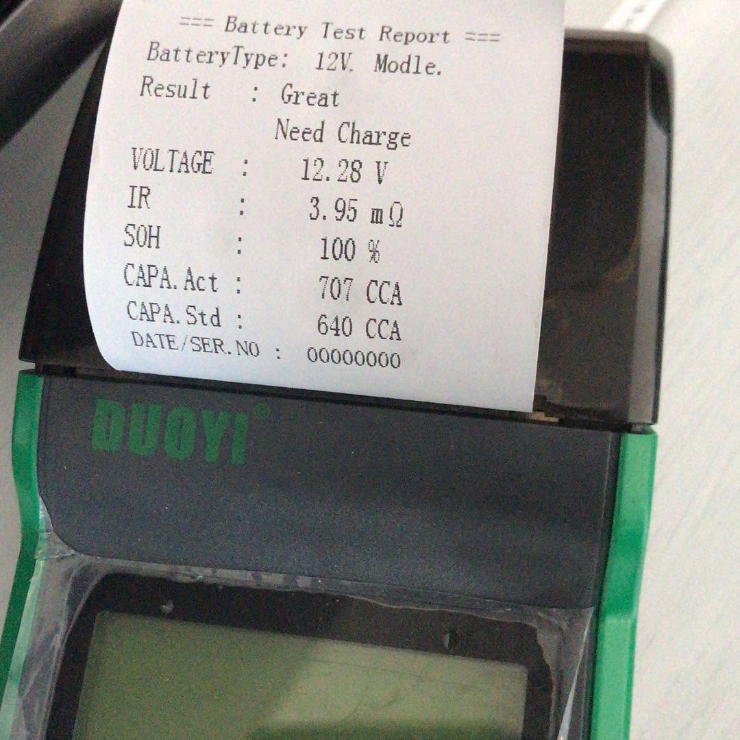 Toyota RAV4 on a hoist connected to an ATF transmission fluid exchange machine during logbook service