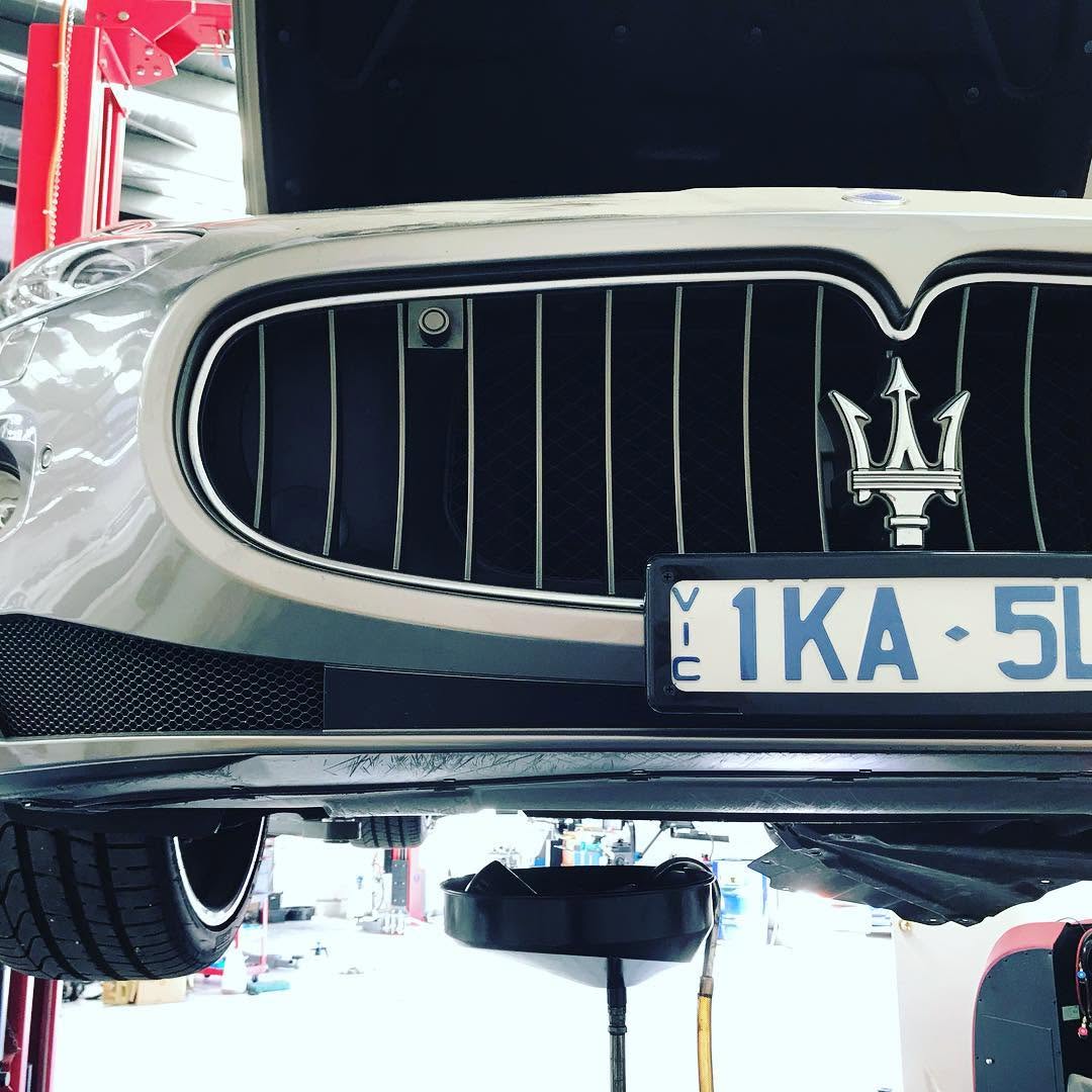 Maserati Quattroporte raised on a hoist at Bright Auto Centre workshop