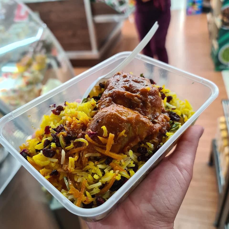Freshly prepared saffron rice and chicken biryani takeaway meal from SPAR North Parramatta deli