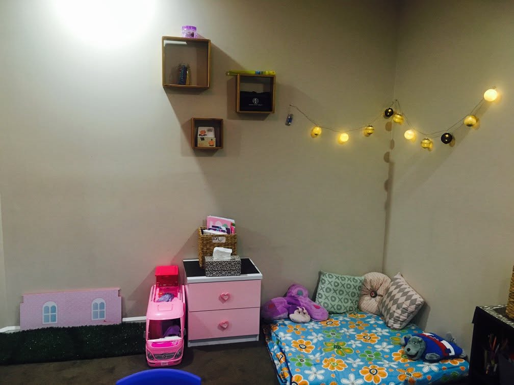 Cosy rest and quiet corner at Orchard Family Day Care with fairy lights and comfortable bedding
