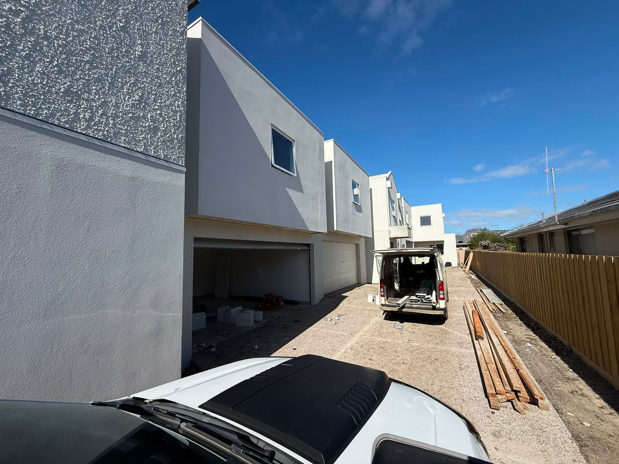 Garage doors installed on a residential driveway