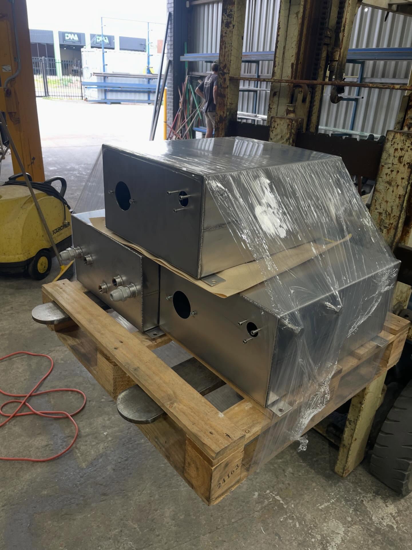 Custom stainless steel fabricated enclosures ready for delivery in the LJP Industries workshop