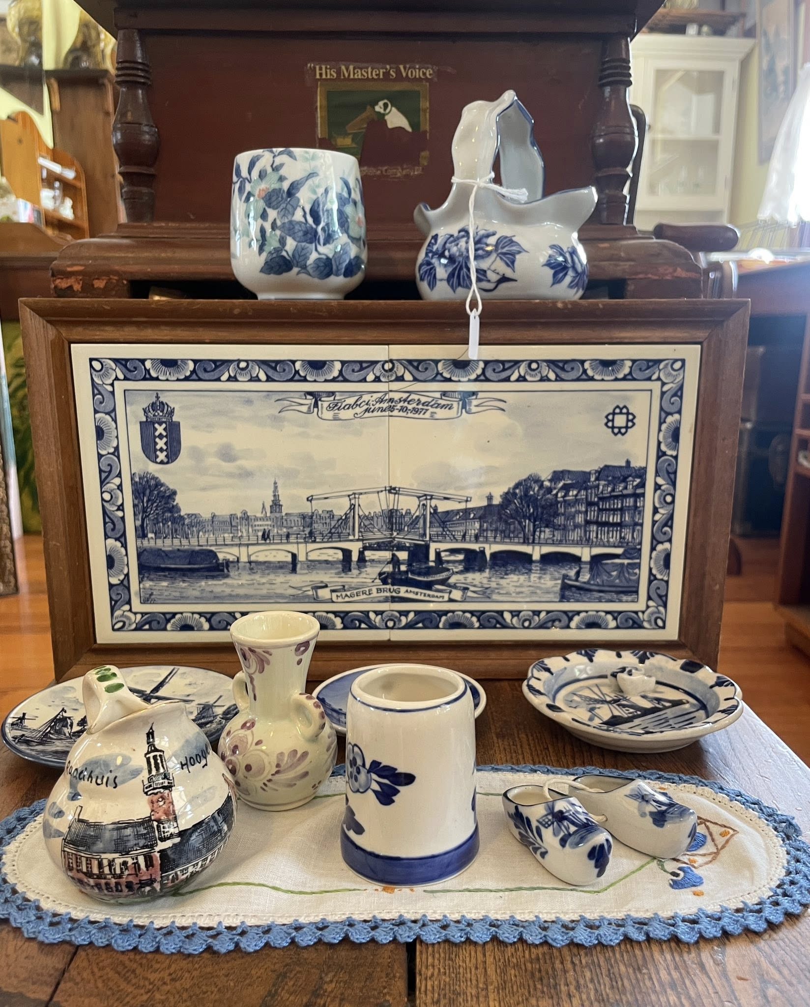 Collection of vintage ceramic fish figurines — part of the antique collectibles available for sale at Bruthen Tearooms