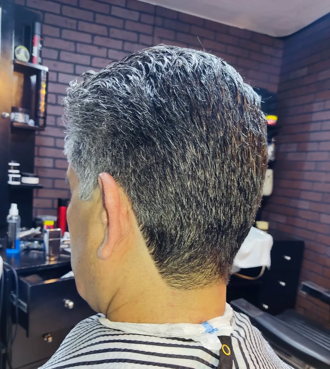 Close-up of a precision taper fade haircut at MH Barbers Studio