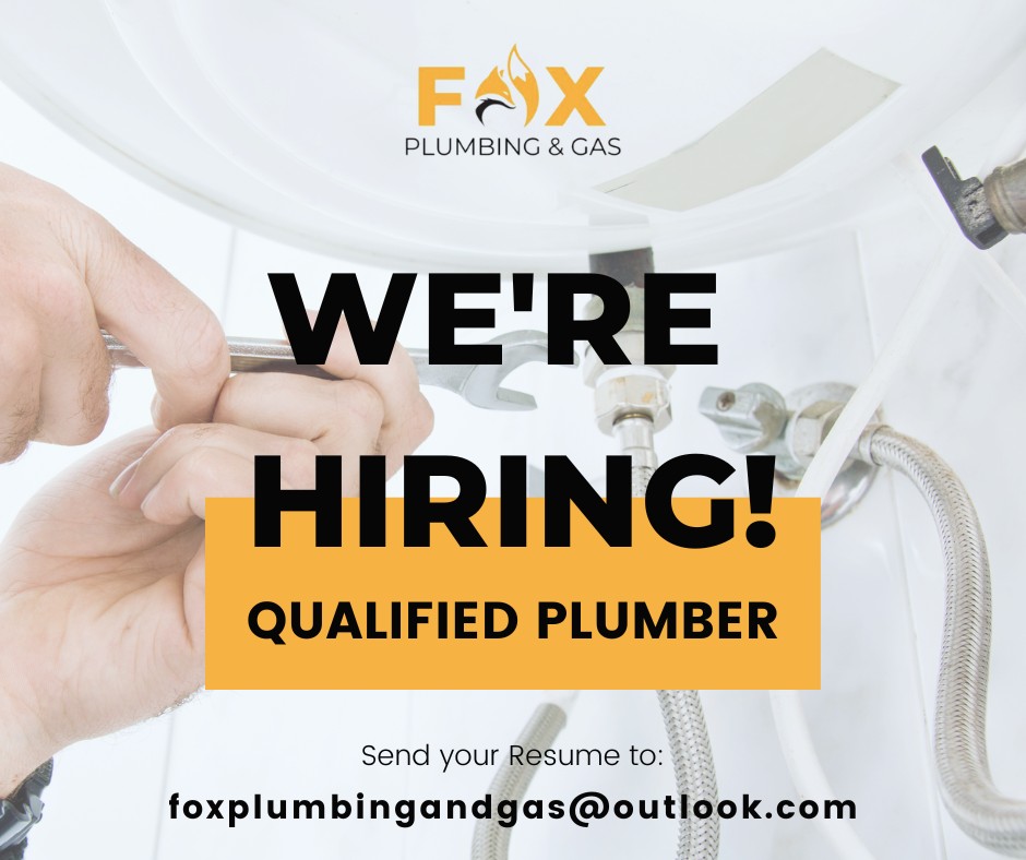 Fox Plumbing and Gas Services — qualified plumber working on a hot water system