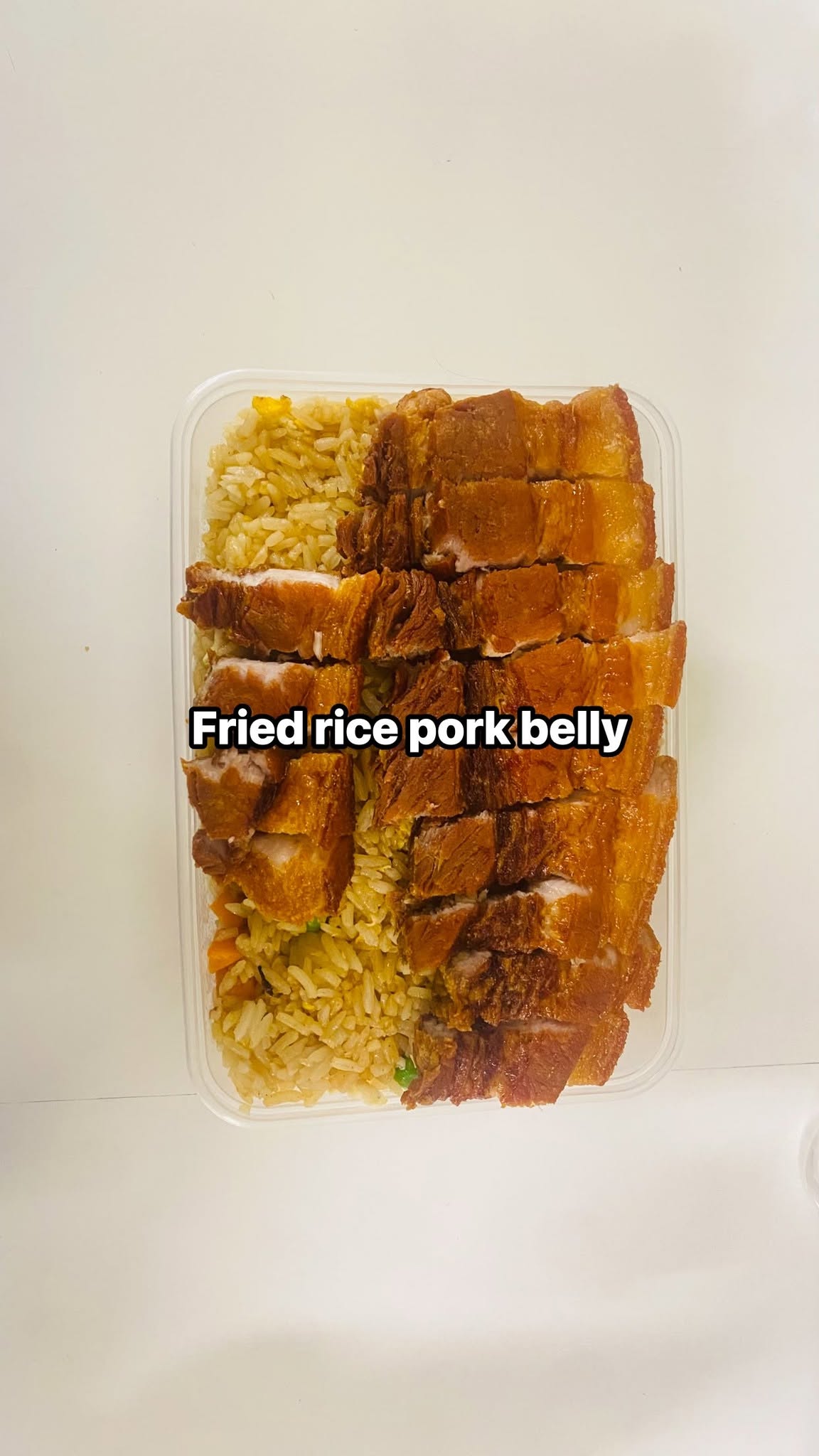 Thai fried rice served with pork belly
