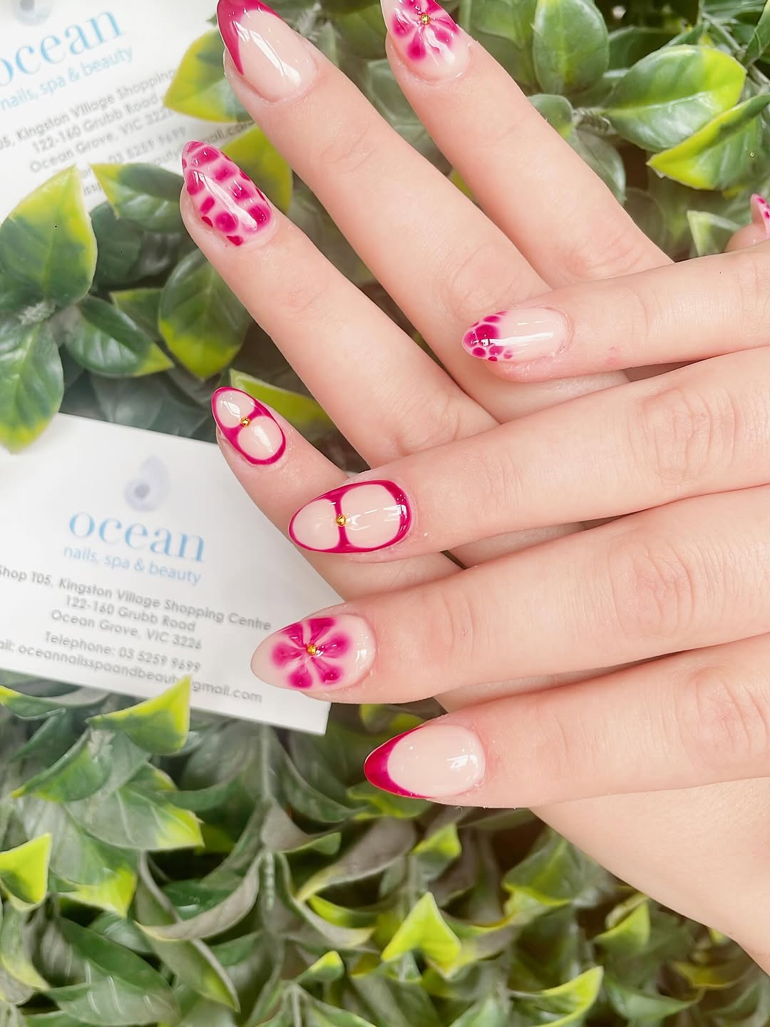 Spring floral nail art in pink and yellow tones