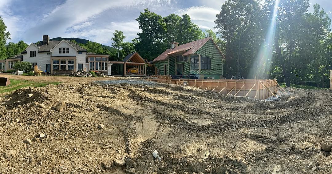 New residential construction site with foundation work in summer