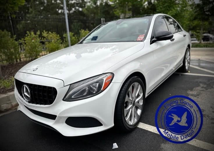 Mercedes C-Class sparkling white after a professional car wash