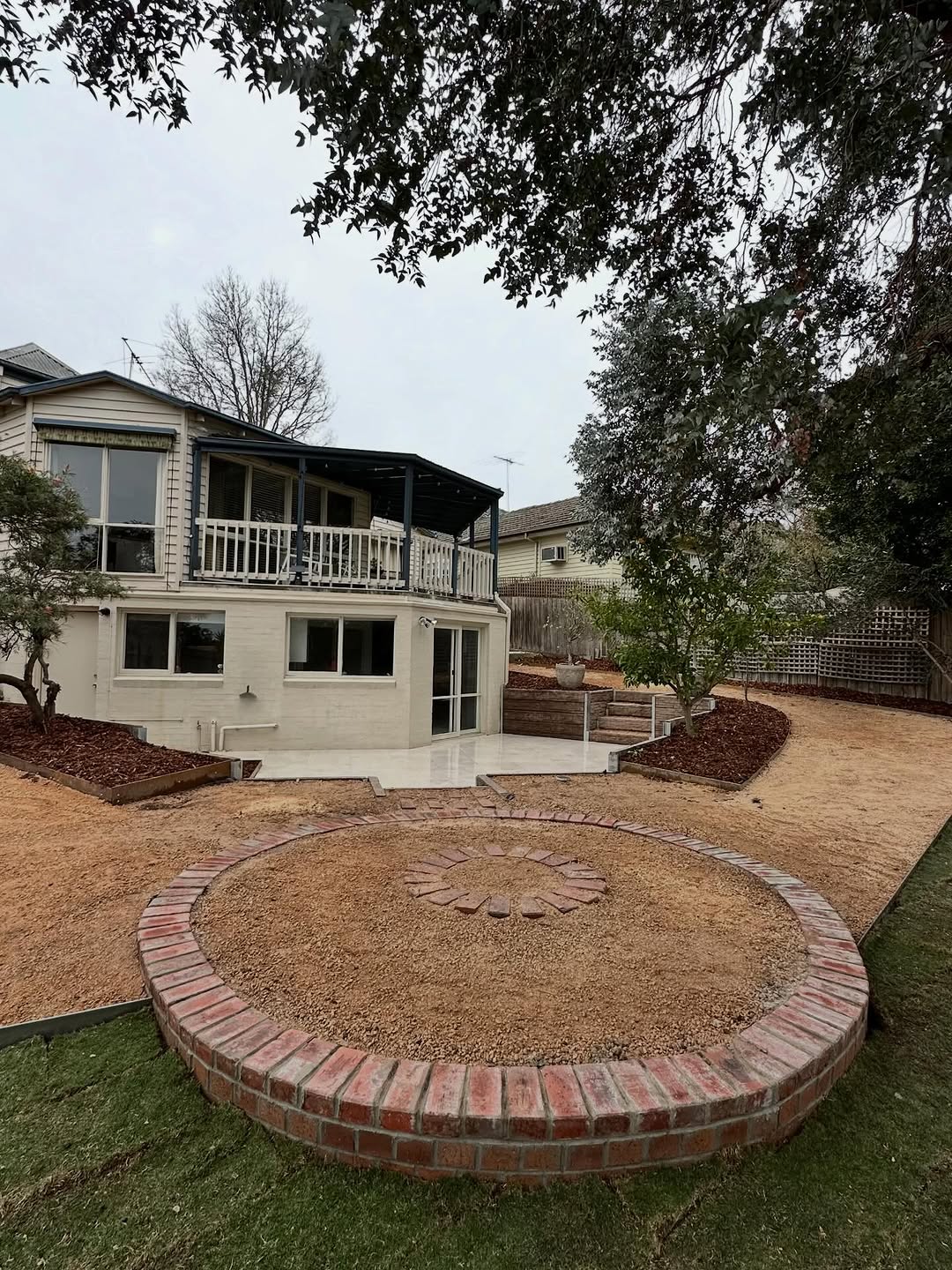 Completed backyard landscaping and fencing project