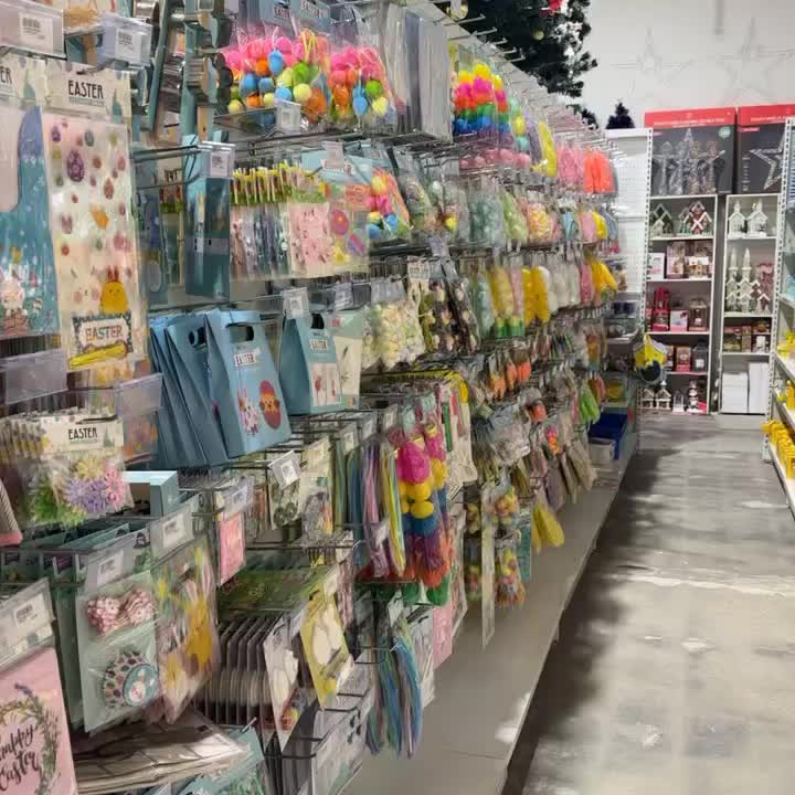 Colourful Easter craft supplies and party goods filling an in-store aisle