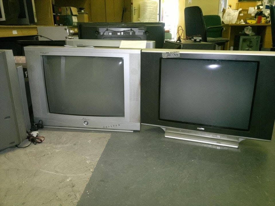 Televisions awaiting repair at the Early Bird TV & Electronic Repairs workshop, Mulgrave