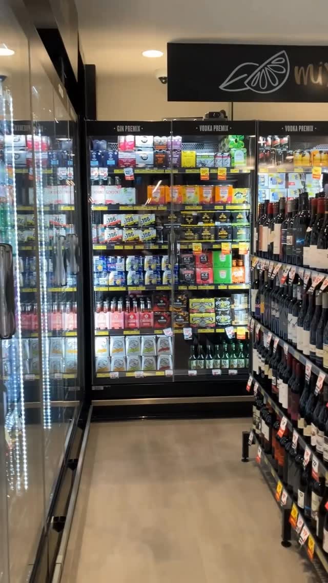 IGA Windsor liquor department — refrigerated premix and wine shelves