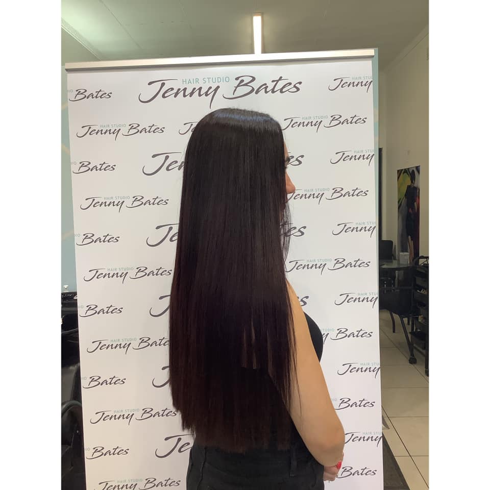 Silky straight keratin-treated long hair result at Jenny Bates Hair Studio — side profile view