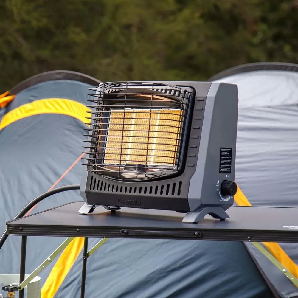 Gasmate portable camping heater glowing at a campsite — outdoor electrical gear at Westec Electrical