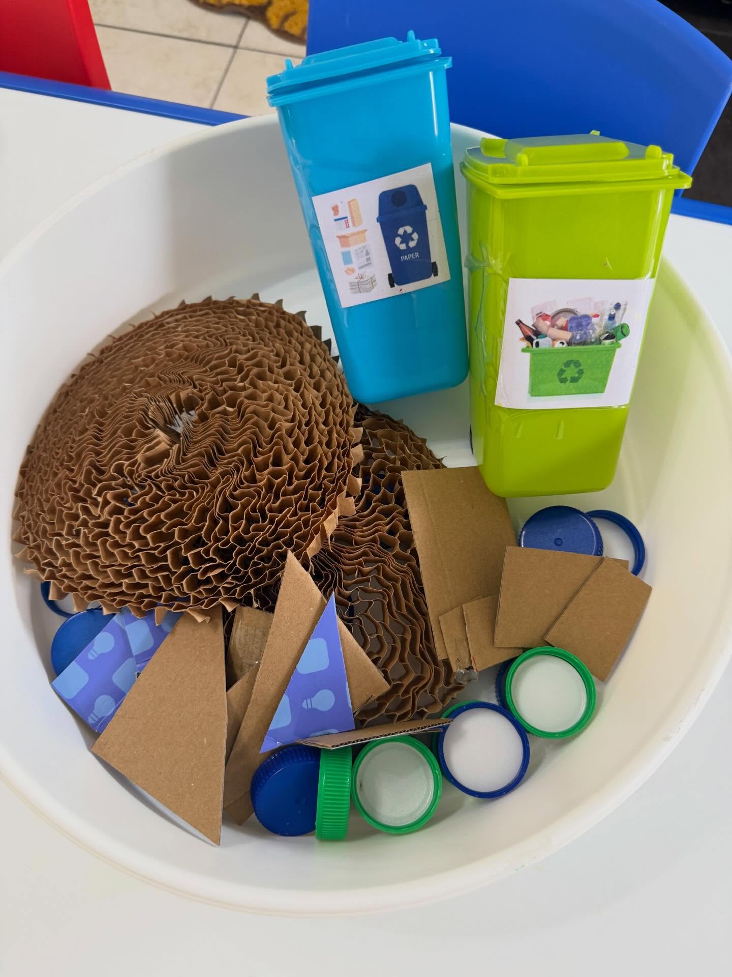 Recycling and sustainability sensory bin activity for early learners